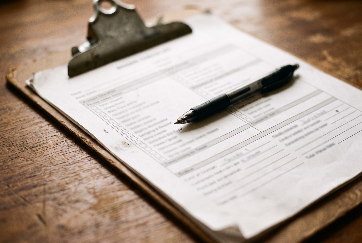 A checklist clipboard close-up, shallow depth of field