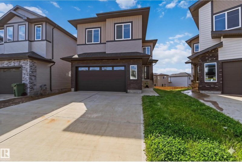 415 Pine Point, Woodbend — new house, photo 1
