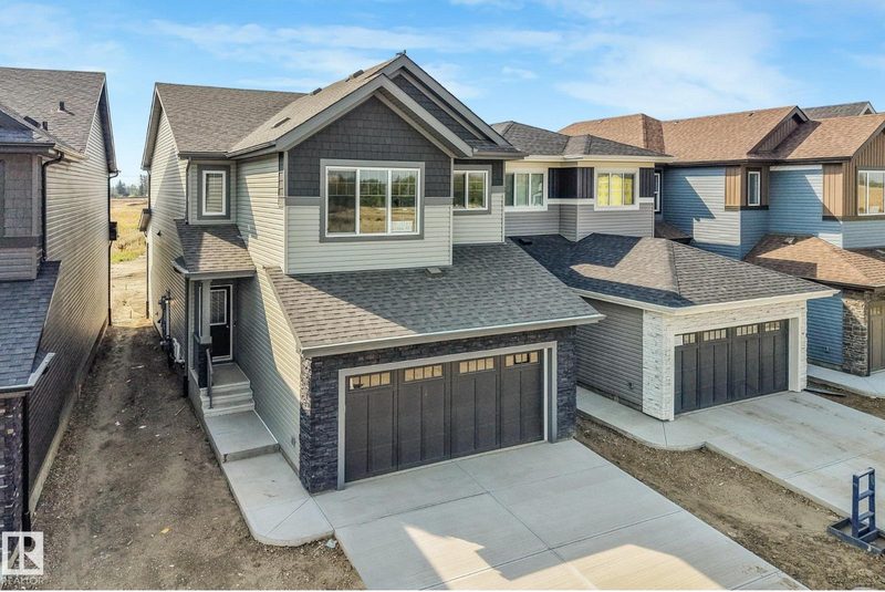 511 157 Avenue NE, Quarry Ridge — new house, photo 1
